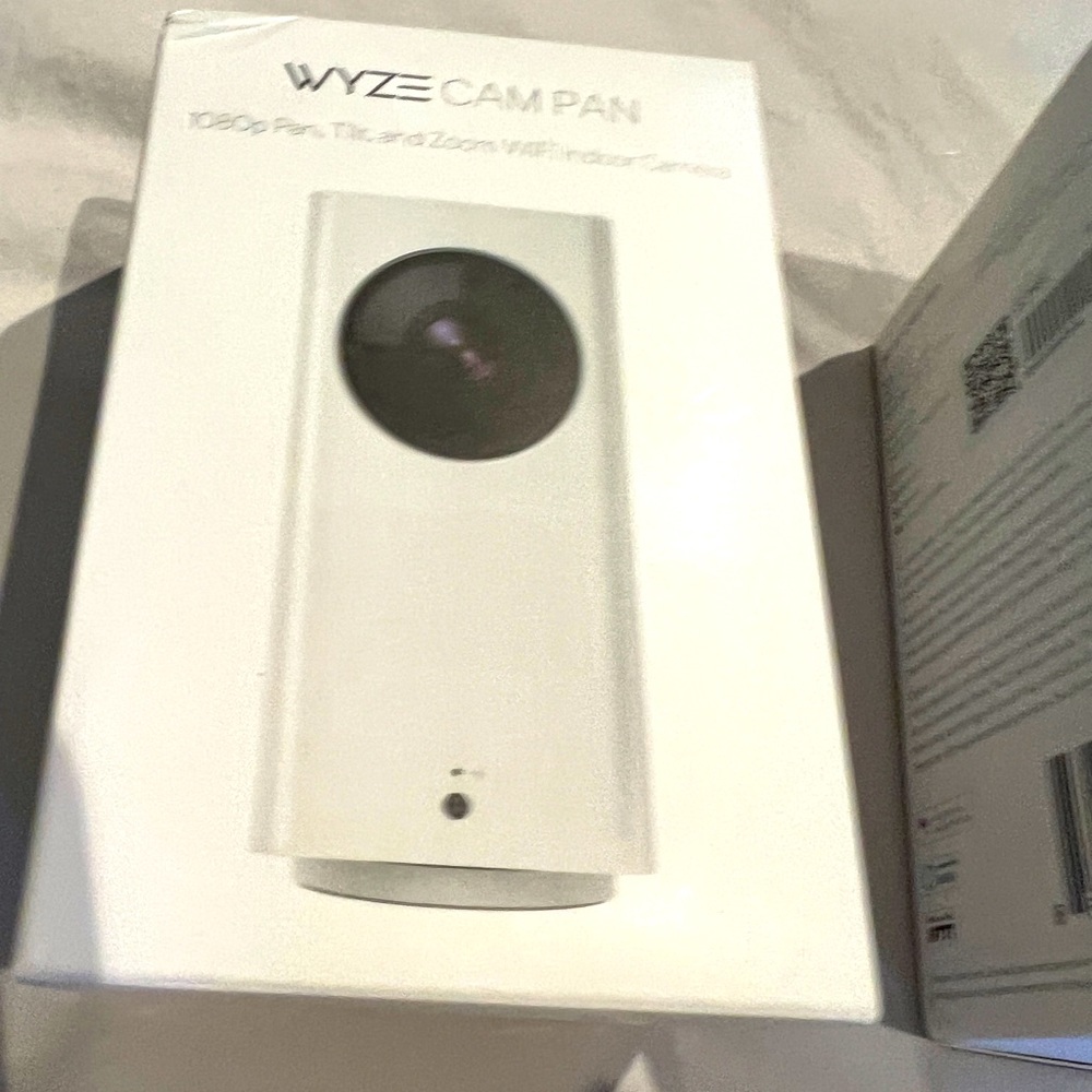 WYZE CAM PAN 1080 P pan, tilt, and zoom Wi-Fi indoor camera